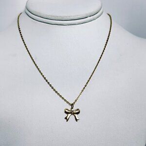Gold Tone Cable Chain Necklace With Pink Rhinestone Bow Pendant (5702)
